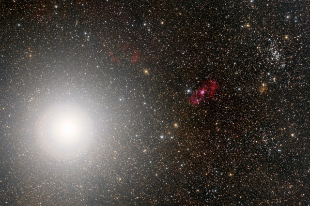 The glare of Alpha Centauri, one of the brightest stars in planet Earth’s night sky, floods the left side of this southern skyscape. Credit: Marco Lorenzi (Glittering Lights).