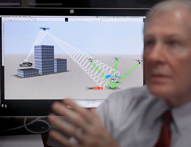 An animation of drone technology used to detect explosives is shown on a computer screen in the office of Jerry Kulcinski, emeritus professor of nuclear engineering and director of the Fusion Technology Lab.    