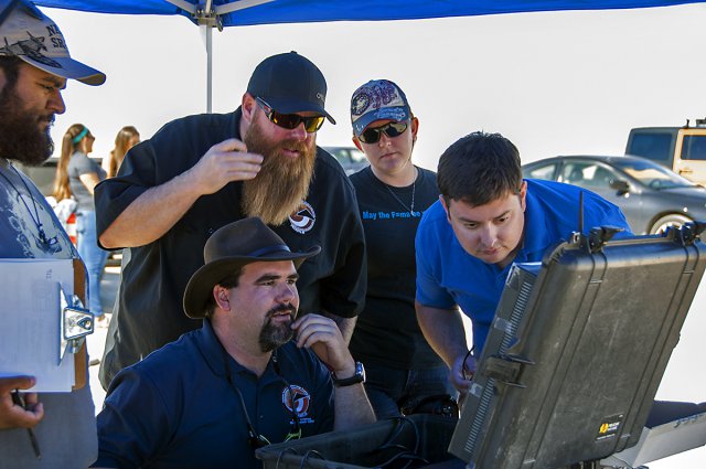 Jonathan Adams, from left, John Bodylski, Justin Hall, Caitlin Kennedy and Dave Berger watch a computer screen providing the Prandtl-M’s exact location and altitude. (NASA Photo / Kyria Luxon)
