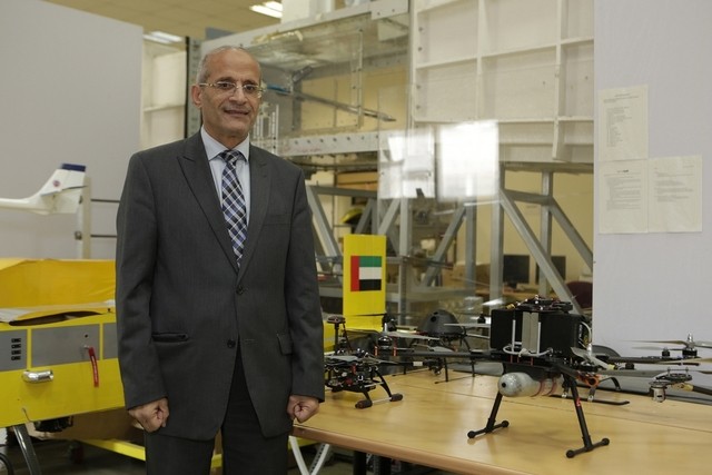 Dr Mohammed A Gadalla with the hydrogen powered drone at the school’s aeronautics laboratory in American University of Sharjah. Jeffrey E Biteng / The National