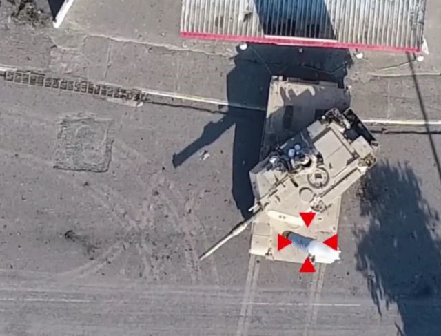 Screen capture from Islamic State video showing a drone munition drop targeting a tank
